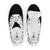 A top-down view of a pair of Orca Snork "Goofy Pup" women's canvas sneakers, showing the inside size tag on the right shoe. The shoes feature a black and white print of goofy dogs and hearts.