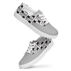 Side view of Orca Snork Playful One-Eyed Cat Women's Canvas Sneakers, featuring the vibrant pattern of our one-eyed feline, Orca, along with paw prints, hearts, fishbones, and blue fish.